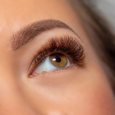 Close up of beautiful eyelash extensions and brow lamination from our Boca Raton location.